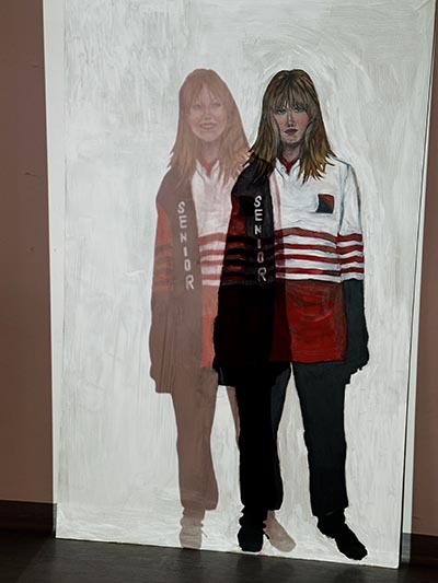 A painting depicting two figures.