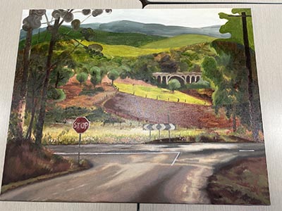 A painting portraying a landscape.