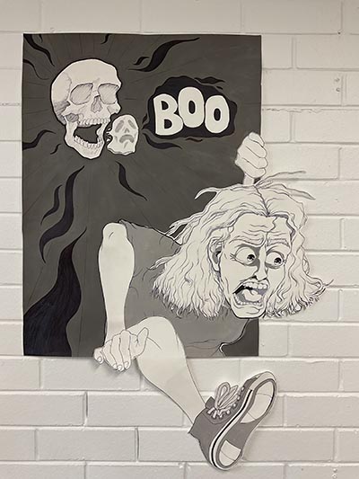 A drawing of a scared person escaping the canvas, with the text 'BOO'  next to a skull and a Scream-like face.