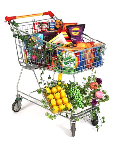 A shopping cart filled with grocery items featuring altered packaging. Fruits like citrus and grapes with modified presentation are placed above the wheels, while vines with leaves entwine around the cart.