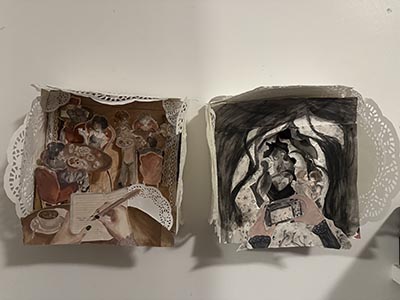 Two paintings encased in paper doilies, each composed of layered materials and paintings that create depth. The first artwork resembles someone documenting a scene they observe in a restaurant, while the second depicts someone capturing a moment through a camera.